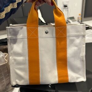 Hermes Canvas Tote with Bold Orange Straps
